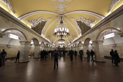 Ornately decorated central passage of the platform, with chandeliers above