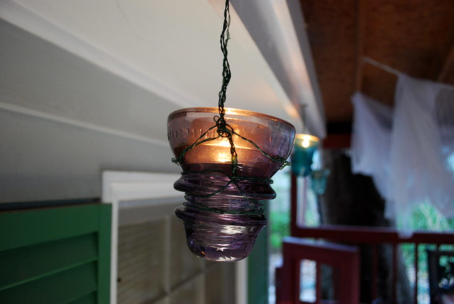 Glass insulator tea light holder