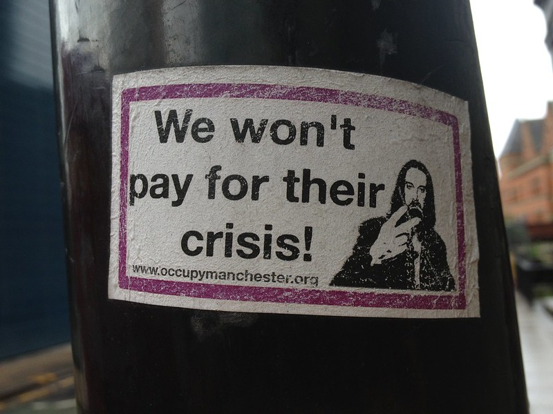 We won't pay for their crisis - Mancunian protest sticker