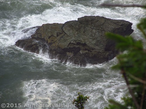 The sea roils around a rock below High Bluff Overlook in Redwood National Park, California