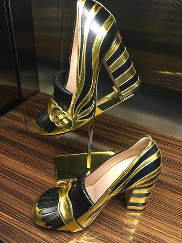 Gucci gold and black shoes