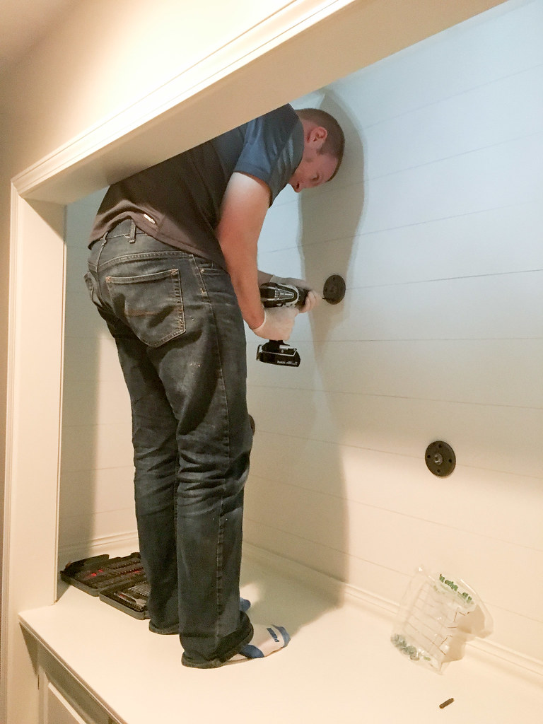 If you're looking for a way to add shiplap to your home then look no further than this DIY shiplap tutorial! This faux DIY shiplap will cost you no more than a gallon of paint and an afternoon. Skill Level: Easy/Beginner 
