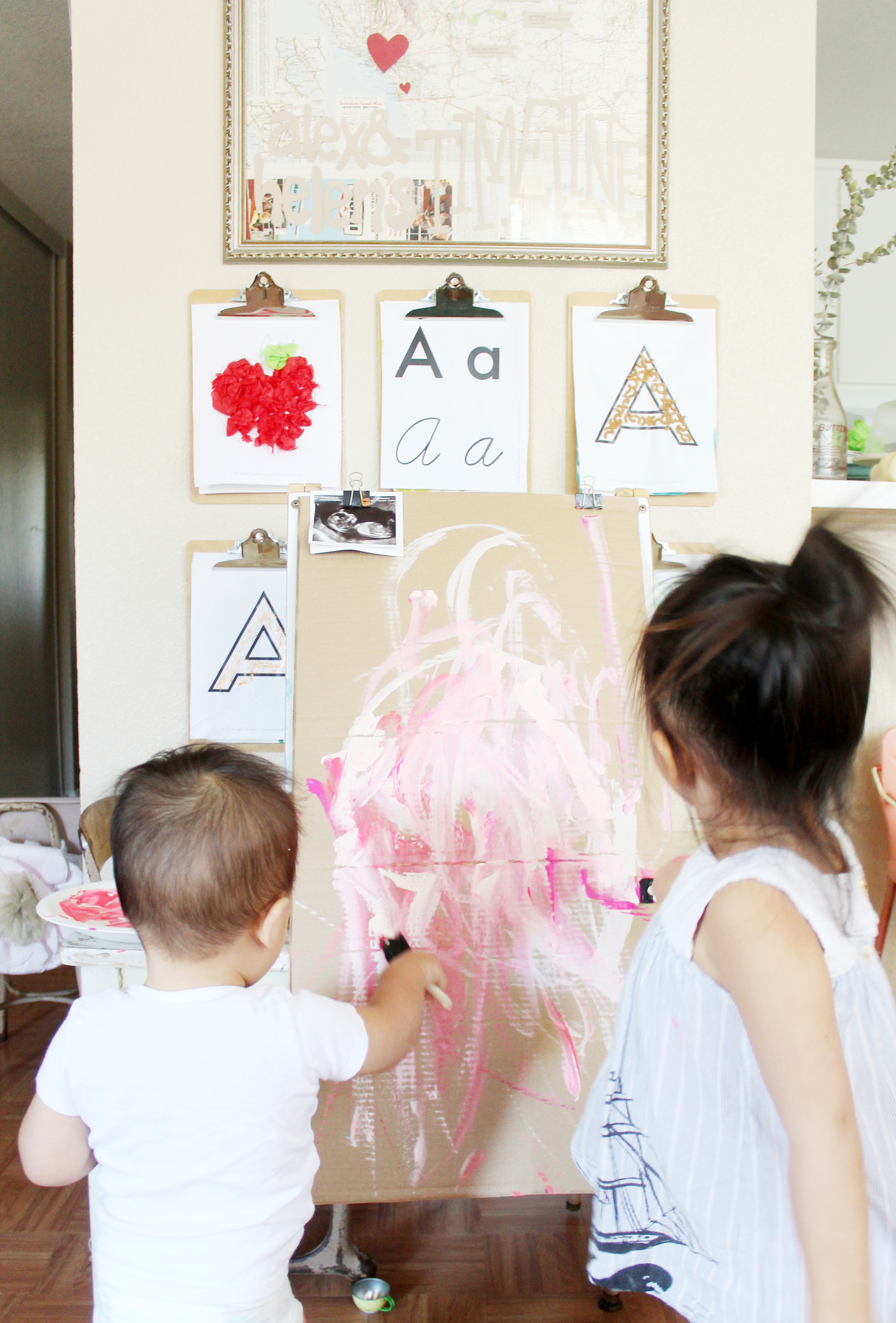 painting for their baby sister