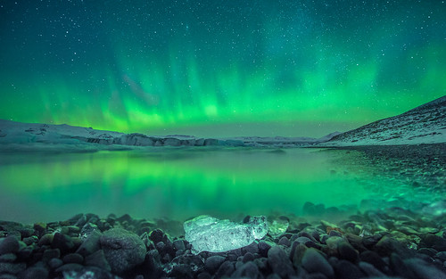 Northern lights with reflection at Jökulsárlón, Iceland