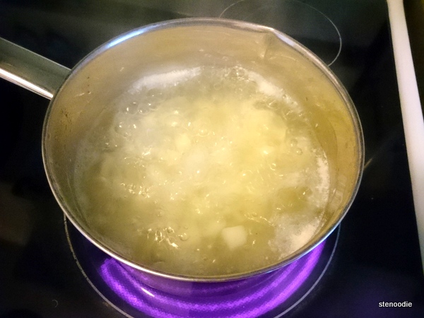  potatoes boiling in pot