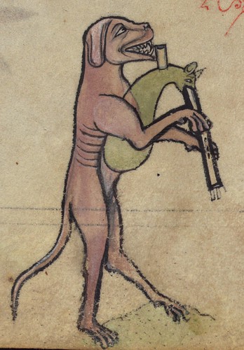 Book of Hours, Dog playing cat bagpipes, from a marginal cycle of images of the funeral of Renard the Fox, Walters Manuscript W.102, fol. 75v detail