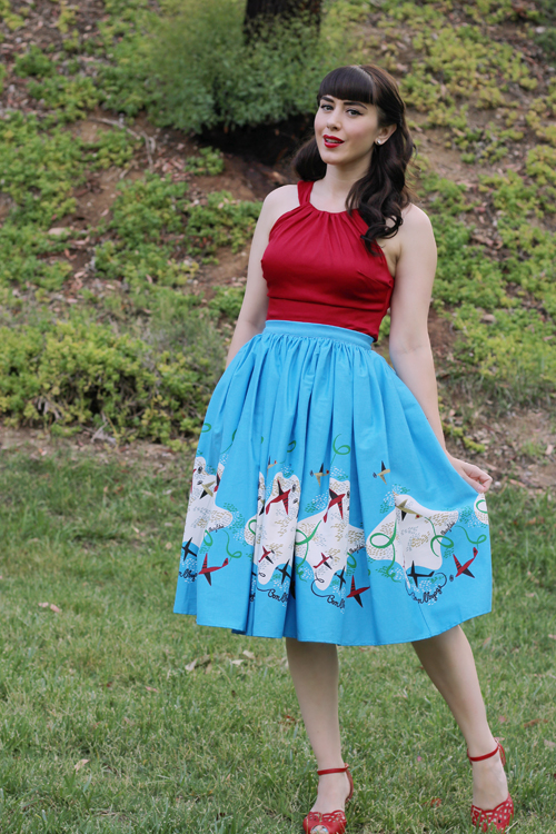 Pinup Girl Clothing Pinup Couture Jenny Skirt in Mary Blair Planes Border Print Harley Top in Red