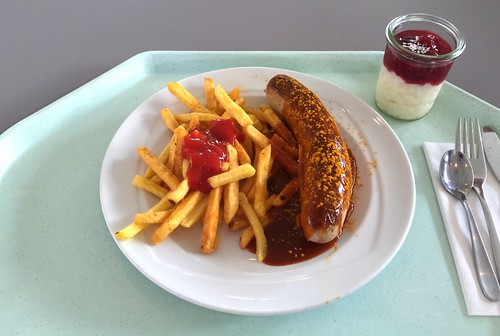 Curried fried sausage with french fries / Currywurst mit Pommes Frites