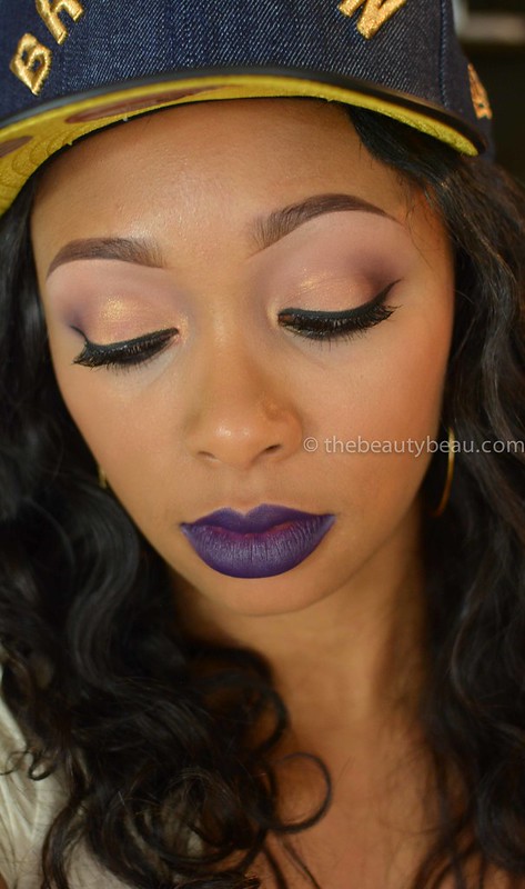 neutral smokey eye with purple lips
