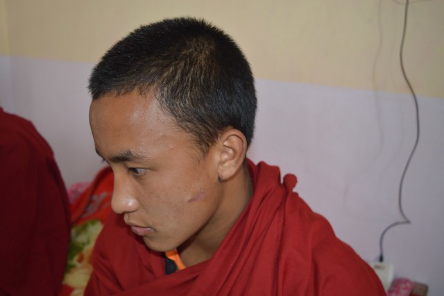 Tenzin Dakpa talks about the May 2 incident.JPG
