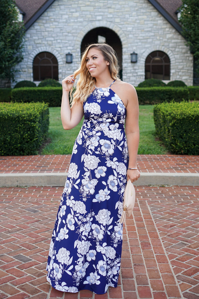 woman in Blue Floral Maxi Dress as the perfect Wedding Guest Dress