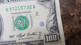 100 dollar bill with chopmark